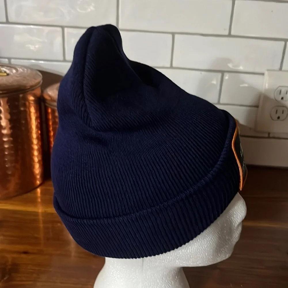 New hat with Grudens label.
